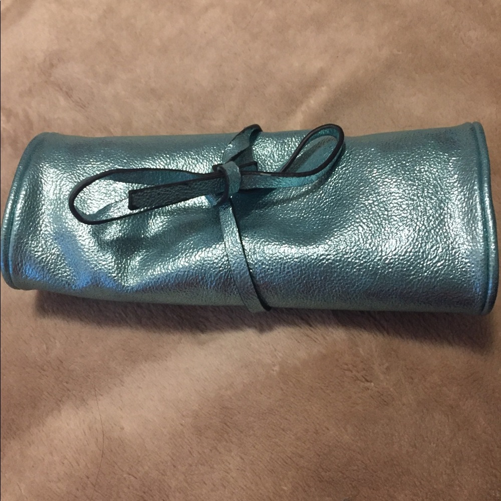 Beautiful never used metallic teal travel roll 🦋